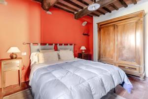 Postel nebo postele na pokoji v ubytování Sambuca Lodge