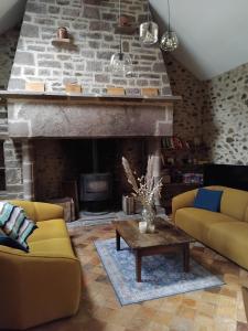 Posezení v ubytování Gîte familial le Puy des Druides