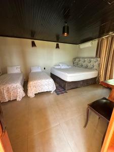 Postel nebo postele na pokoji v ubytování Estância Vista dos Pireneus + 26 fotografií