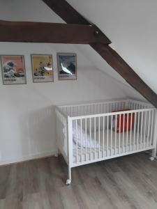 Postel nebo postele na pokoji v ubytování Gîte familial le Puy des Druides