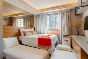 Postel nebo postele na pokoji v ubytování DFARIA905 - Ap Luxo c vaga Prox Ibirapuera Metrô e Hospitais