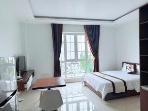 Ένα ή περισσότερα κρεβάτια σε δωμάτιο στο Vienna Hotel +17 φωτογραφίες