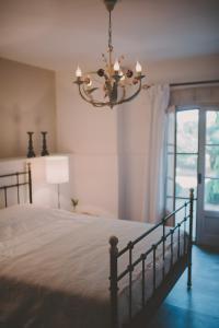 Ένα ή περισσότερα κρεβάτια σε δωμάτιο στο Renoir - Mas De Rey