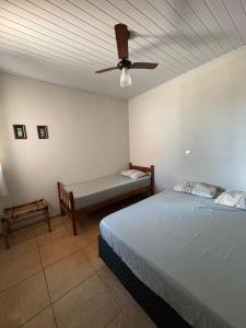 Ένα ή περισσότερα κρεβάτια σε δωμάτιο στο Recanto Lemes