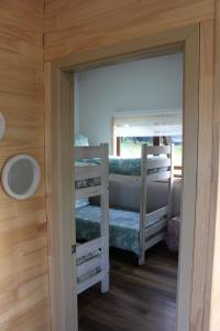 Ένα ή περισσότερα κρεβάτια σε δωμάτιο στο Amanecer del Ranco