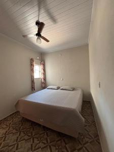 Ένα ή περισσότερα κρεβάτια σε δωμάτιο στο Recanto Lemes