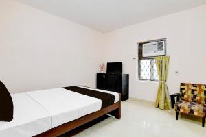 TV a/nebo společenská místnost v ubytování Super Hotel O City Of Joy