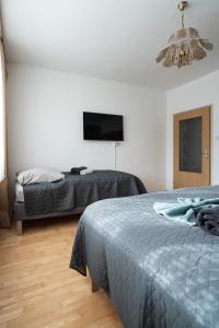 Postel nebo postele na pokoji v ubytování revLIVING Lodge Kleinstelzendorf Hollabrunn - 4 Schlafzimmer