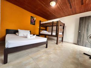 a bedroom with two bunk beds in a room at Hotel San Pedro in Monterrey