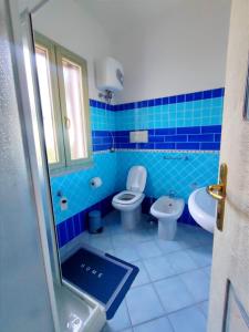 Et badeværelse på Villetta bifamiliare con vista mare