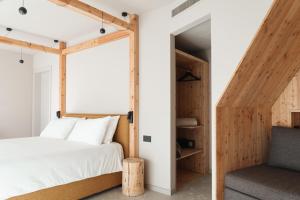 Ένα ή περισσότερα κρεβάτια σε δωμάτιο στο Agritur Lawanda