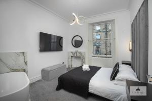 Ένα ή περισσότερα κρεβάτια σε δωμάτιο στο 2Bedroom apartment by the castle