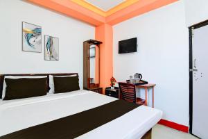 Voodi või voodid majutusasutuse Hotel O Swami Vivekananda University Kolkata toas +21 fotot