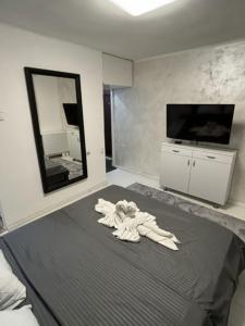 Ένα ή περισσότερα κρεβάτια σε δωμάτιο στο Apartmani Classic NP