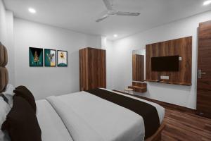 Ένα ή περισσότερα κρεβάτια σε δωμάτιο στο Hotel O THE ERA INFINITY HOTEL +24 φωτογραφίες