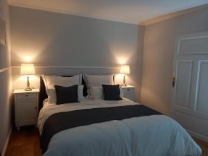 Postel nebo postele na pokoji v ubytování Zum Hermannsberg