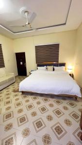 Ένα ή περισσότερα κρεβάτια σε δωμάτιο στο Senalli Hotel +47 φωτογραφίες