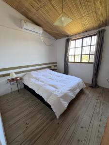 Ένα ή περισσότερα κρεβάτια σε δωμάτιο στο Cabaña jujoak