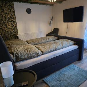 Postel nebo postele na pokoji v ubytování Nordlicht