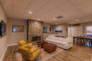 a living room with a couch and a fireplace at Robin Hoods Retreat in Jefferson +93 photos