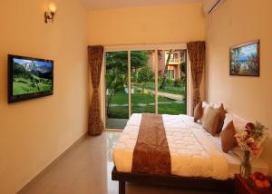 Letto o letti in una camera di The Byke Old Anchor Beach Resort & Spa