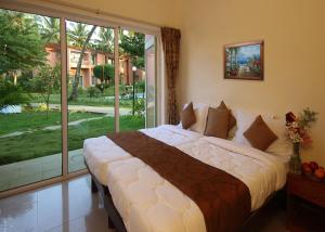 Letto o letti in una camera di The Byke Old Anchor Beach Resort & Spa