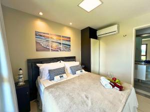 Postel nebo postele na pokoji v ubytování VG Sun Cumbuco Delicinha de Apto para 4 pessoas + 55 fotografií