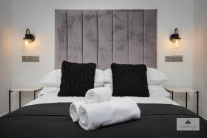 Ένα ή περισσότερα κρεβάτια σε δωμάτιο στο Royal Mile Apartment 2Bedroom