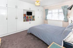 Giường trong phòng chung tại Heathrow Horizon Homestay