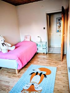 Postel nebo postele na pokoji v ubytování La stub de nöel