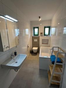 Ένα μπάνιο στο Komfort Domizil Erfurt