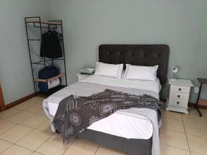 Ένα ή περισσότερα κρεβάτια σε δωμάτιο στο Villa De Lyden