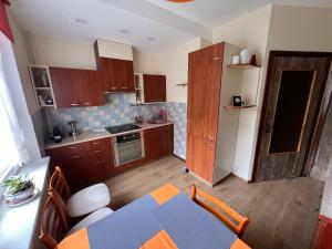 Køkken eller tekøkken på Prisiminkim praeitį