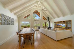 a living room with a table and a couch at Banner Elk Valley Overlook in Banner Elk