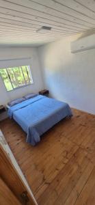 Postel nebo postele na pokoji v ubytování Cabañas del Sol