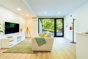 Μια τηλεόραση ή/και κέντρο ψυχαγωγίας στο Nobregas Lodge