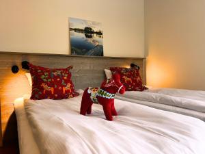 Ένα ή περισσότερα κρεβάτια σε δωμάτιο στο Fridhemsgatan City Stay