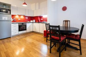 Kuchyň nebo kuchyňský kout v ubytování Cozy Heaven