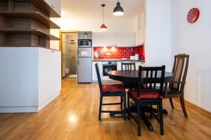 Kuchyň nebo kuchyňský kout v ubytování Cozy Heaven