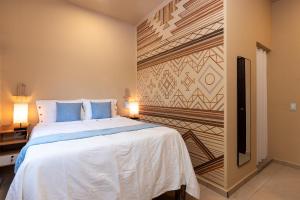 Ένα ή περισσότερα κρεβάτια σε δωμάτιο στο 5min to Beach & Downtown, High-Speed WiFi, Laundry Service, PetsOK