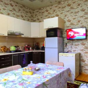 Η κουζίνα ή μικρή κουζίνα στο Lerik renthouse