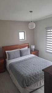 Postel nebo postele na pokoji v ubytování Hostal Terraza Traslaviña + 6 fotografií