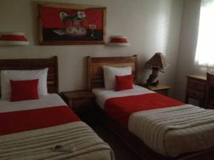 Ένα ή περισσότερα κρεβάτια σε δωμάτιο στο Beachfront apartment +2 φωτογραφίες