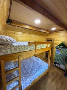 Palanda nebo palandy na pokoji v ubytování Refugio en el Mar