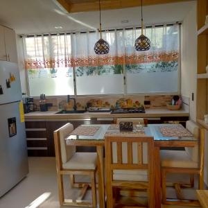 Photo de la galerie de l'établissement Departamento de 2 dormitorios en la Victoria, cerca de las Universidades con garaje gratis, à Ibarra