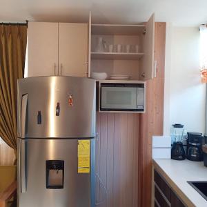 Photo de la galerie de l'établissement Departamento de 2 dormitorios en la Victoria, cerca de las Universidades con garaje gratis, à Ibarra