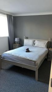 a bedroom with a bed with a bowl on it at Whole property in Kirkcaldy Fife in Fife
