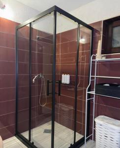 a shower with a glass enclosure in a bathroom at Mountain villa in Gorna Belica - Villa Hani in Struga +87 photos