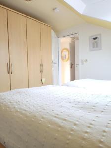 Postel nebo postele na pokoji v ubytování Seestern + 11 fotografií