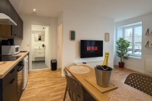 Η κουζίνα ή μικρή κουζίνα στο Le Fjord Mâconnais Central - Station - Cosy